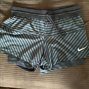 Nike black and gray running shorts. Size small.